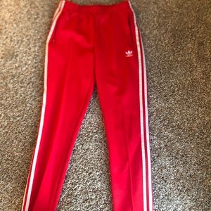 Red adidas pants